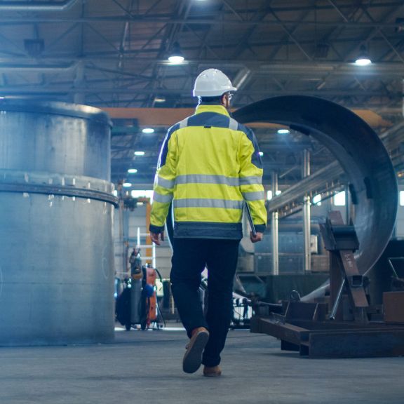 Worker in manufacturing plant